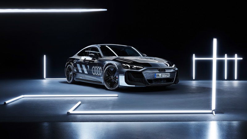 Bmw gt4 показан в тёмной комнате с неоновыми огнями (ауди rs e tron gt прототип, 2024, 5k, светодиодное освещение, машины)