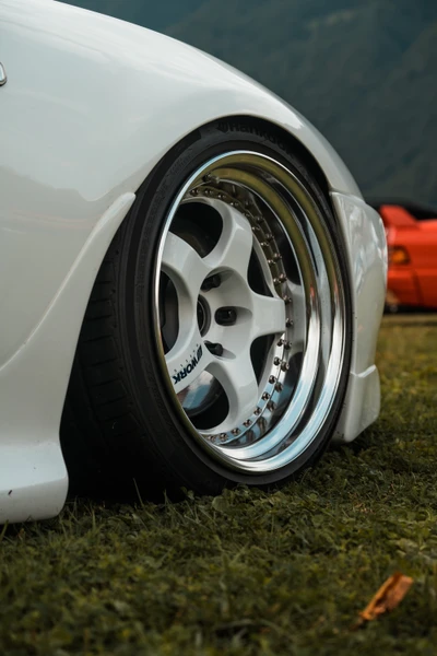 Sleek Alloy Wheel on a Sports Car with Low Profile Tire