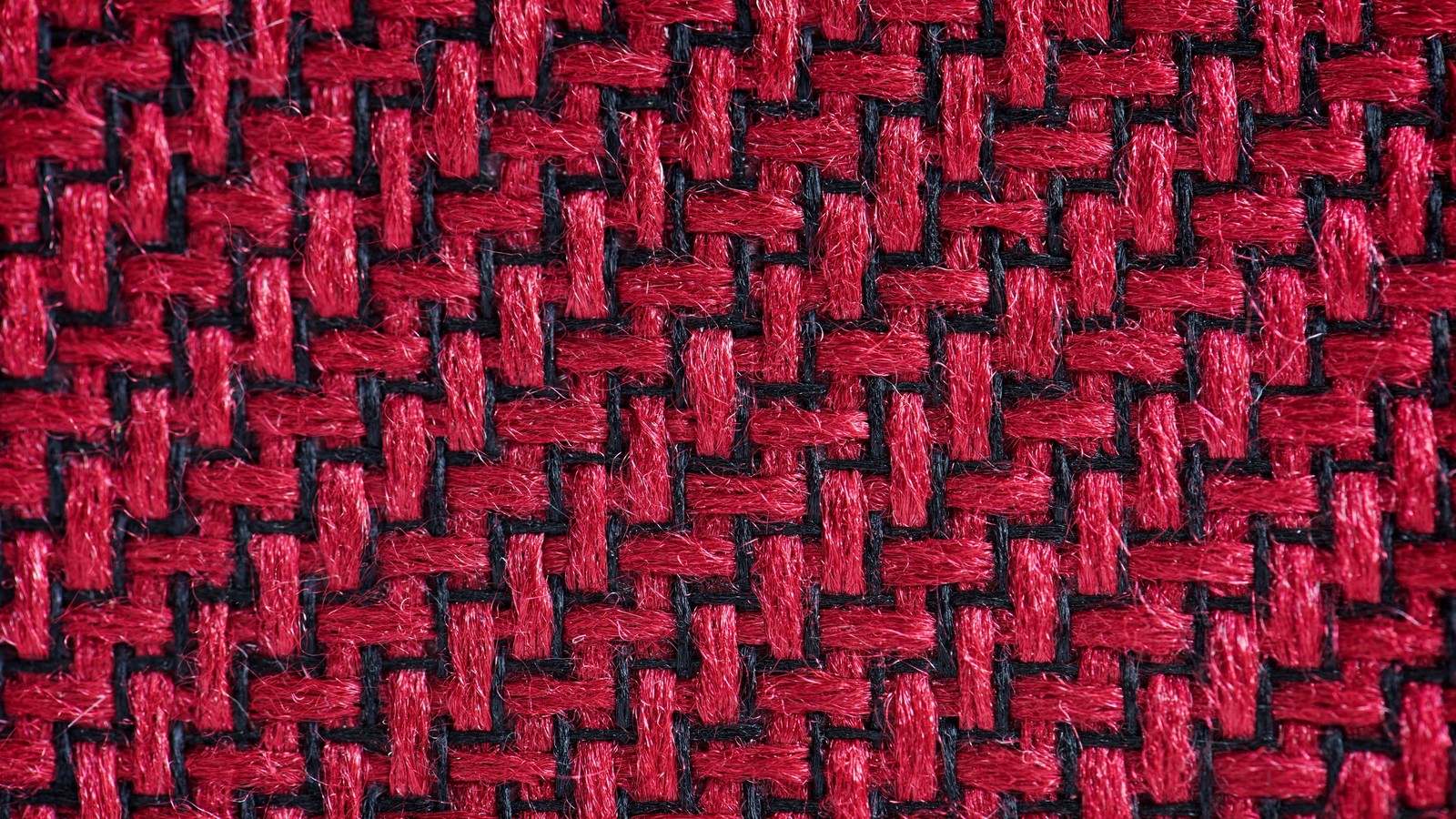 Un gros plan d'un tissu tissé rouge et noir avec une bande noire (textile, texture, tissu tissé, rouge, motif)