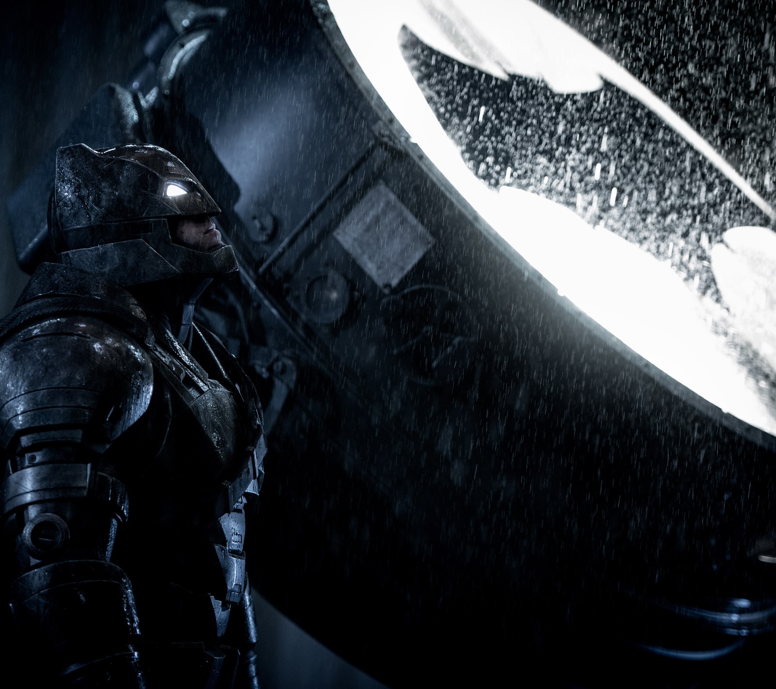 Batman in the rain with a bat in the background (batman, batman vs superman, fight, superman)