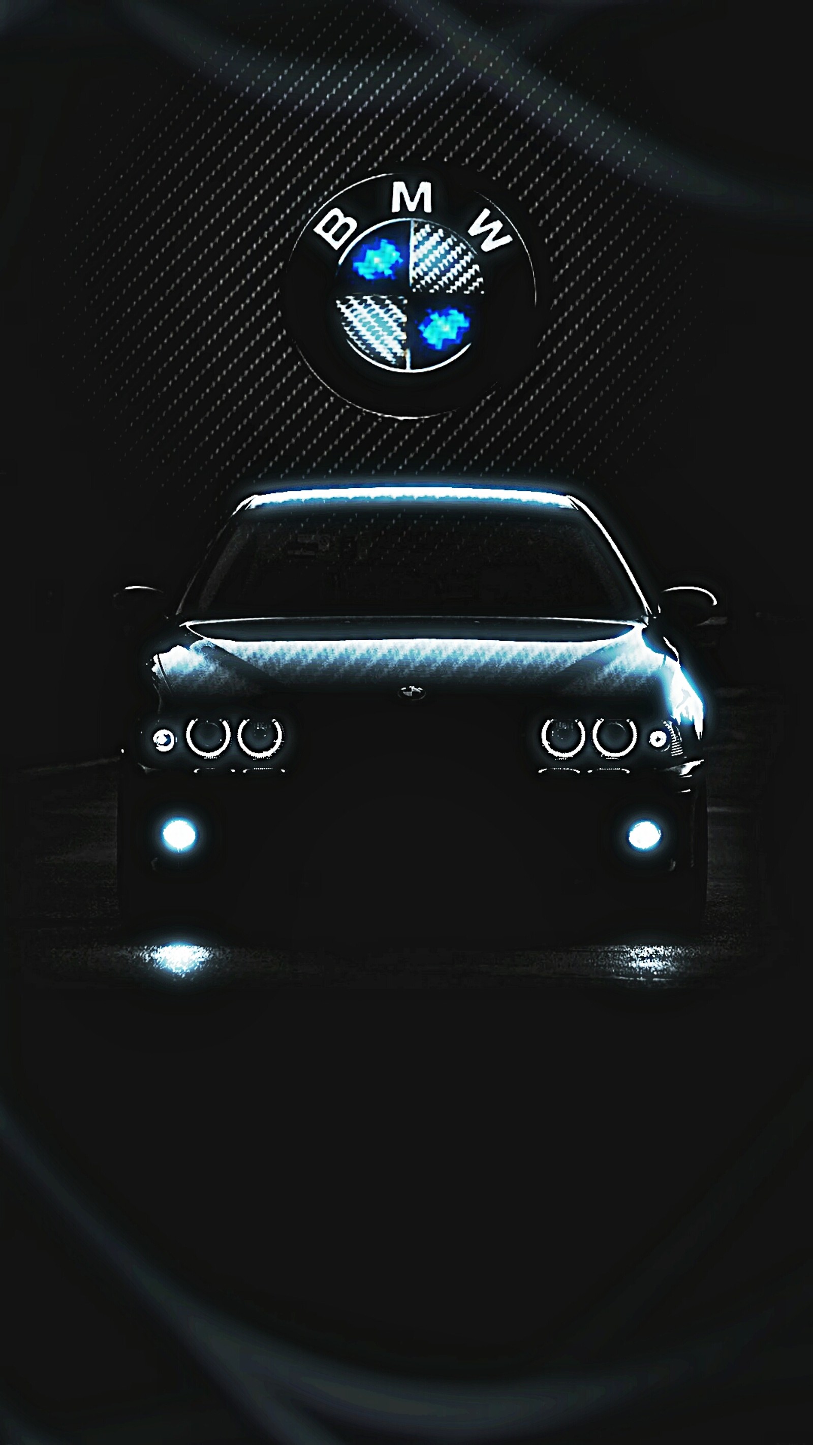 Bmw logo on a car in a dark room with a black background (black, bm, bmw, car, hd)