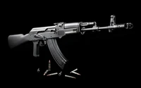 Rifle de asalto AK-47 con munición exhibida