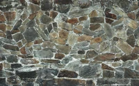 Textured Stone Wall with Varied Geometric Patterns