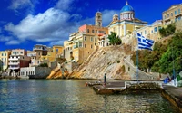 Picturesque Coastal Town in Greece with Harbor and Historic Architecture