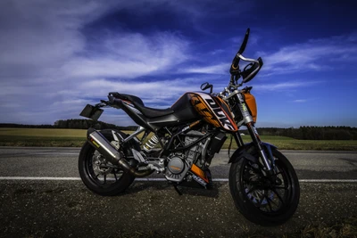 Мотоцикл KTM Supermoto на фоне драматического неба