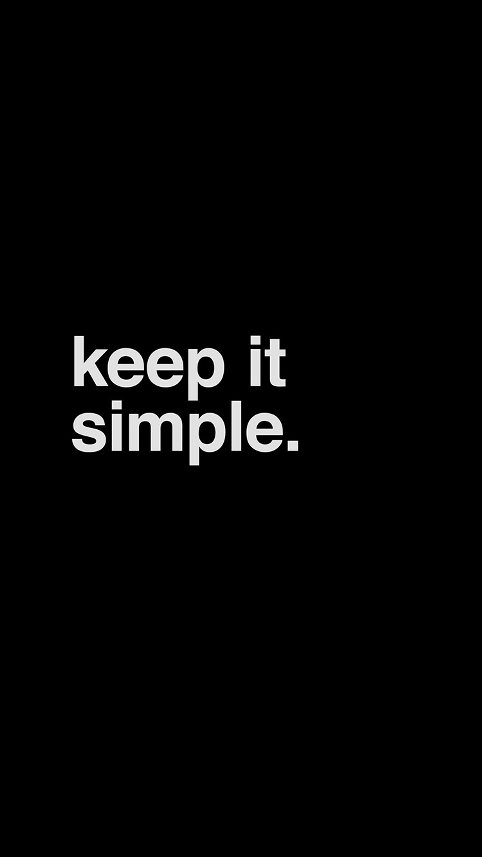 Eine nahaufnahme eines schwarzen hintergrunds mit dem weißen text "keep it simple" (schwarz, helvetica, keep it simple)