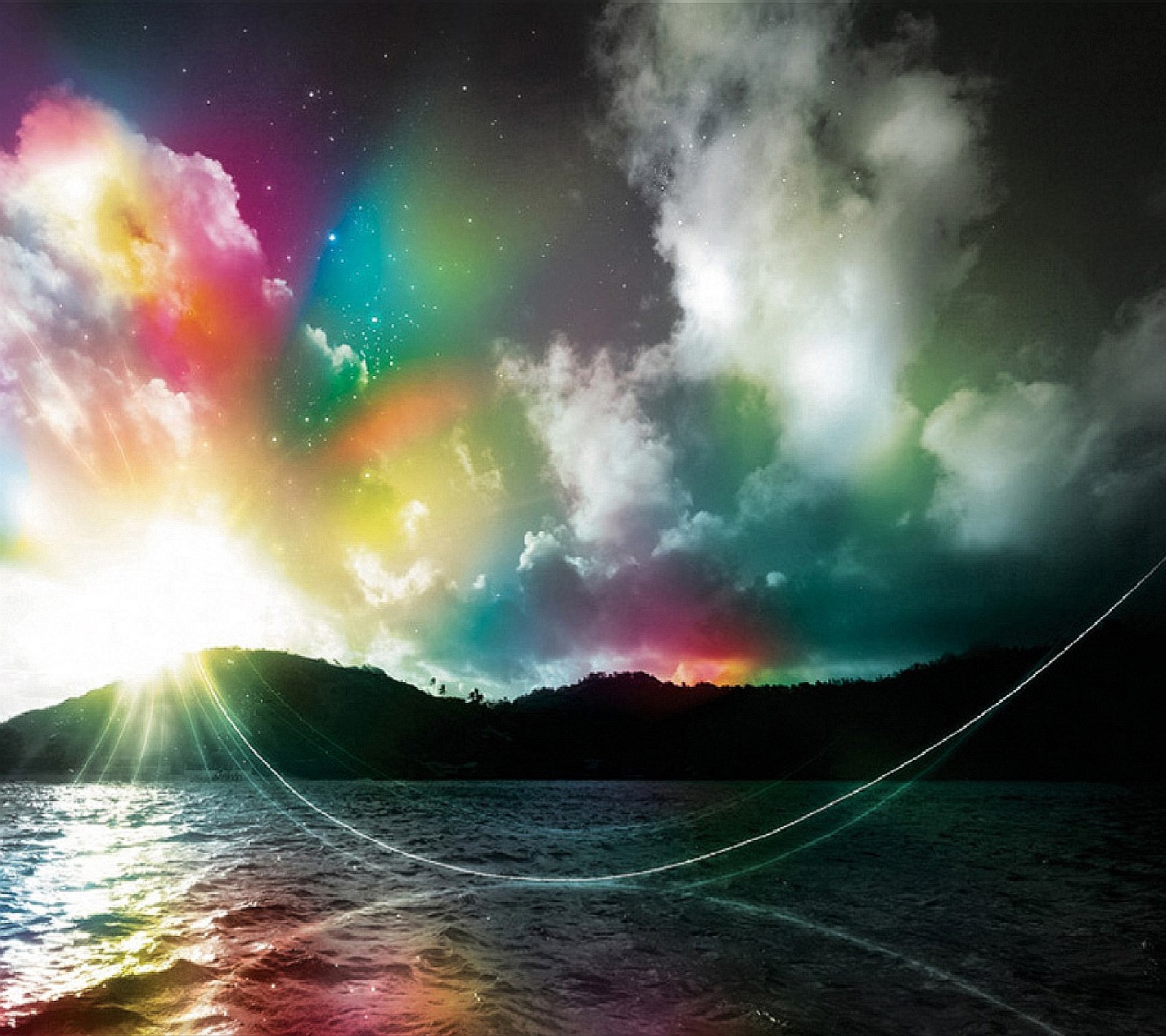 A brightly colored rainbow is in the sky over a body of water (nature)