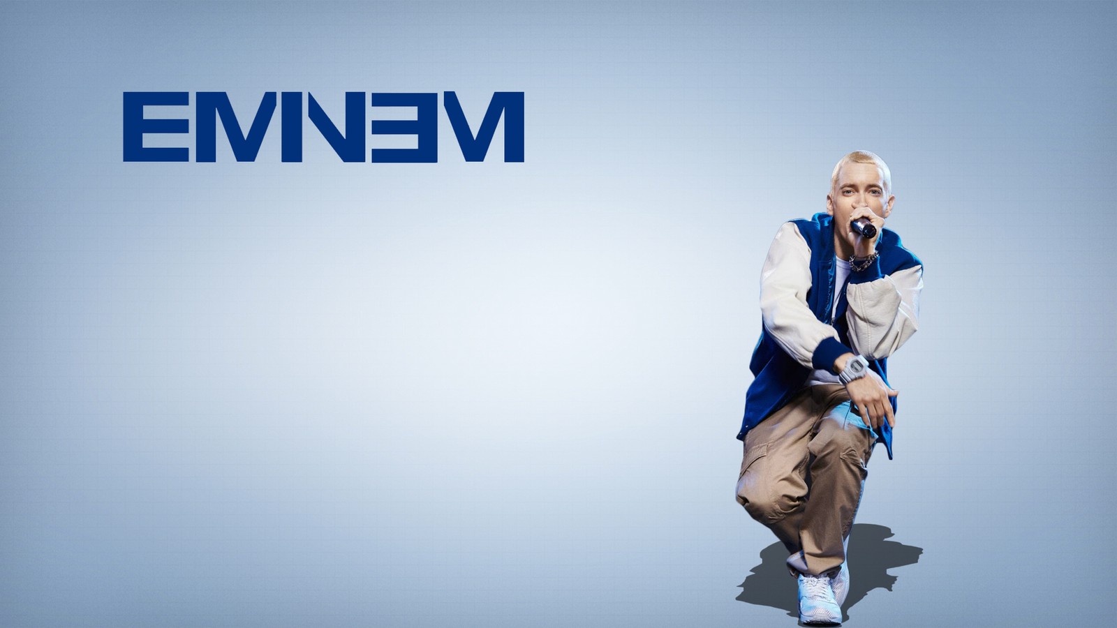 Arafed image of a man in a vest and tie holding a microphone (eminem, free, brand, advertising)