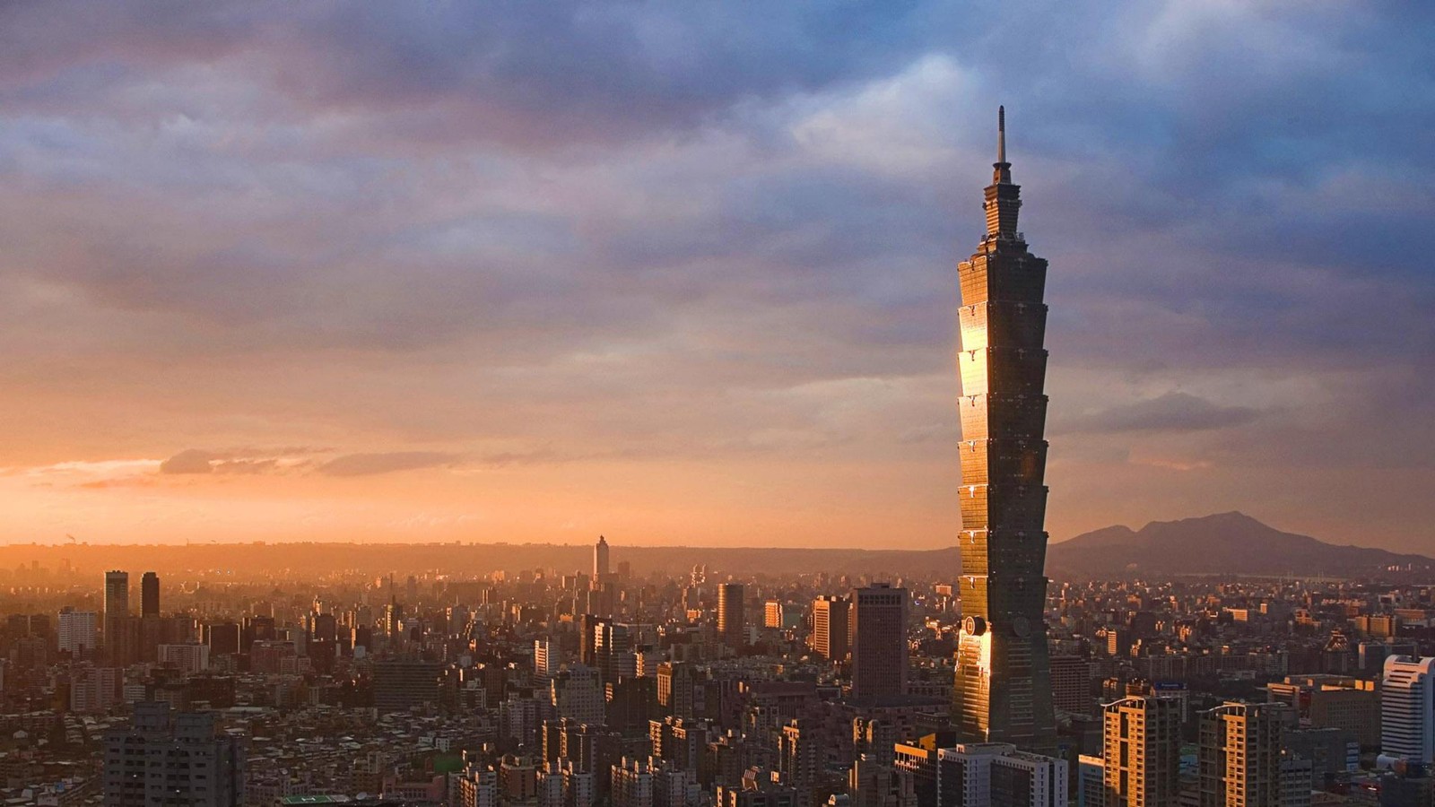 Arafed view of a city with a tall building in the middle (taipei 101, skyscraper, cityscape, city, urban area)