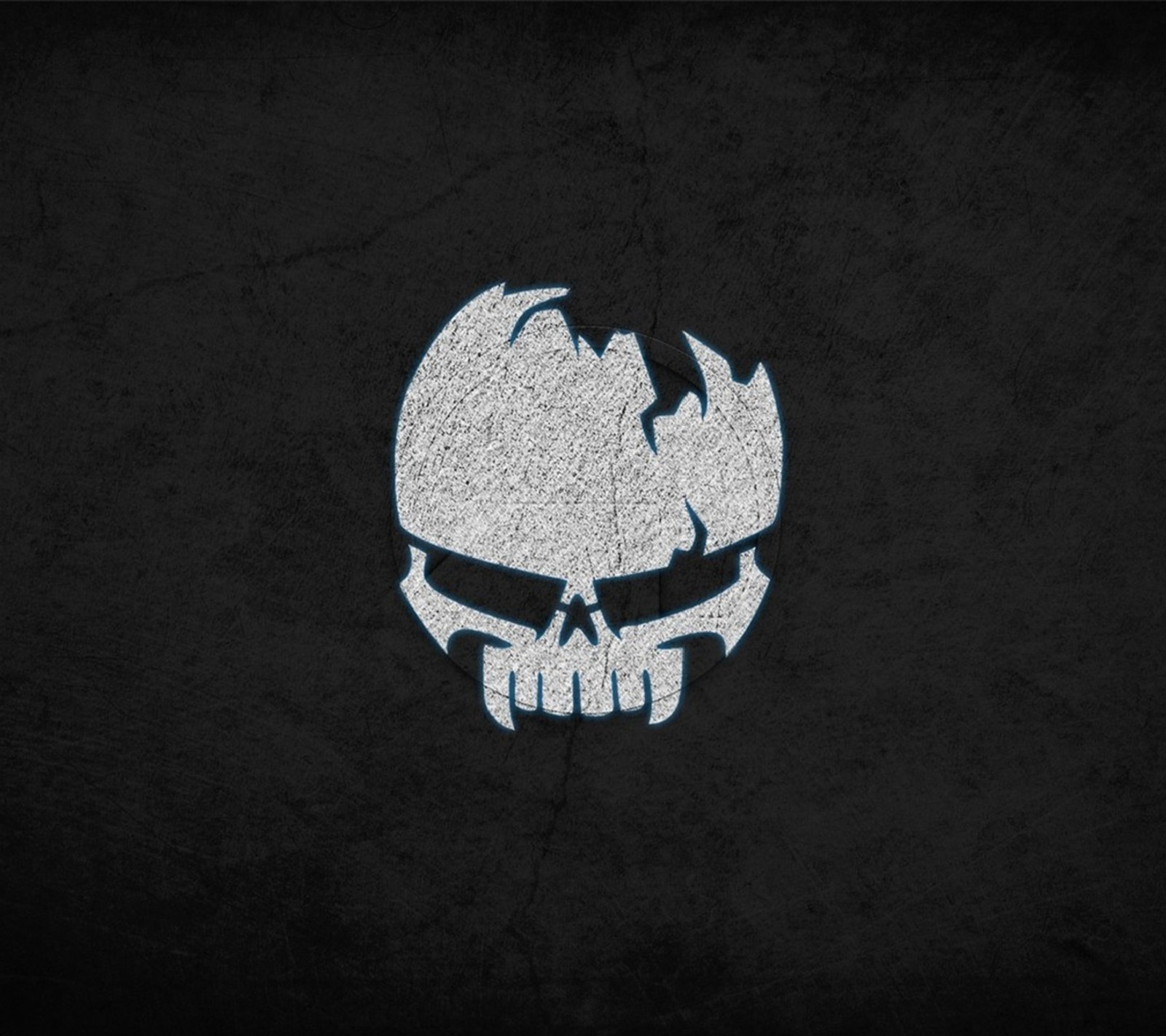 A black and white skull logo on a black background (entertainment, halloween, haunted, horror, scary)