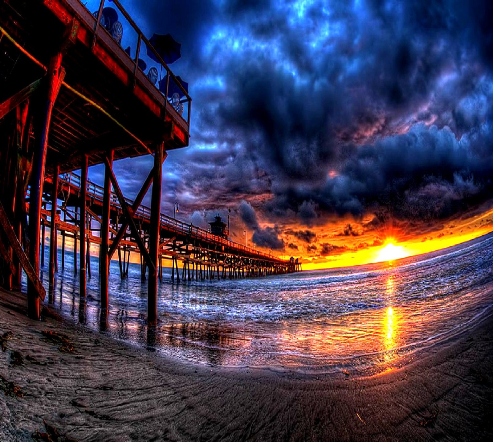 Arafed view of a pier at sunset with a cloudy sky (nature)