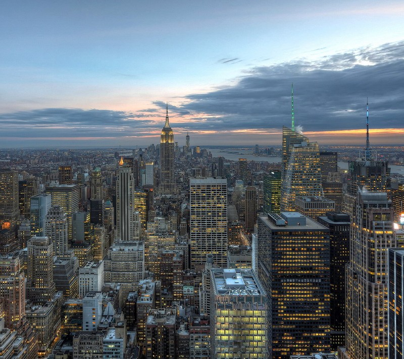 Арафед вид города на закате с несколькими зданиями (нью йорк, new york, сша, usa)