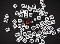 letter blocks, символы любви, черный фон, сердцевидная форма, текст о любви