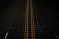 Symmetrical Black Mesh with Illuminated Lines: A Modern Architectural Pattern