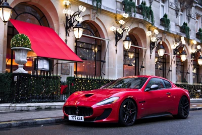 Red Maserati GranTurismo: A Luxurious Sports Car in an Elegant Urban Setting