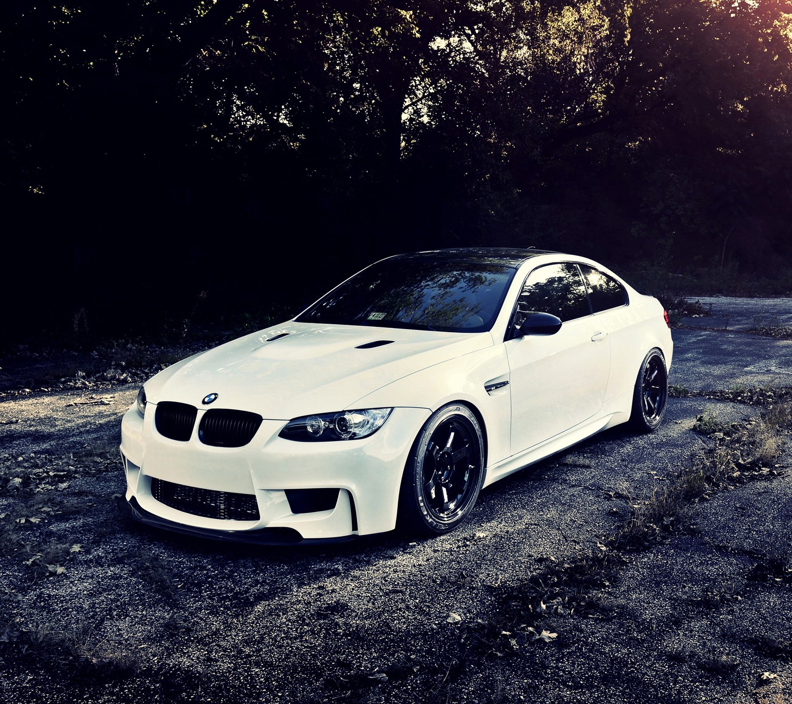 A close up of a white car parked on a dirt road (bmw, coupe, e92, m3, modified)