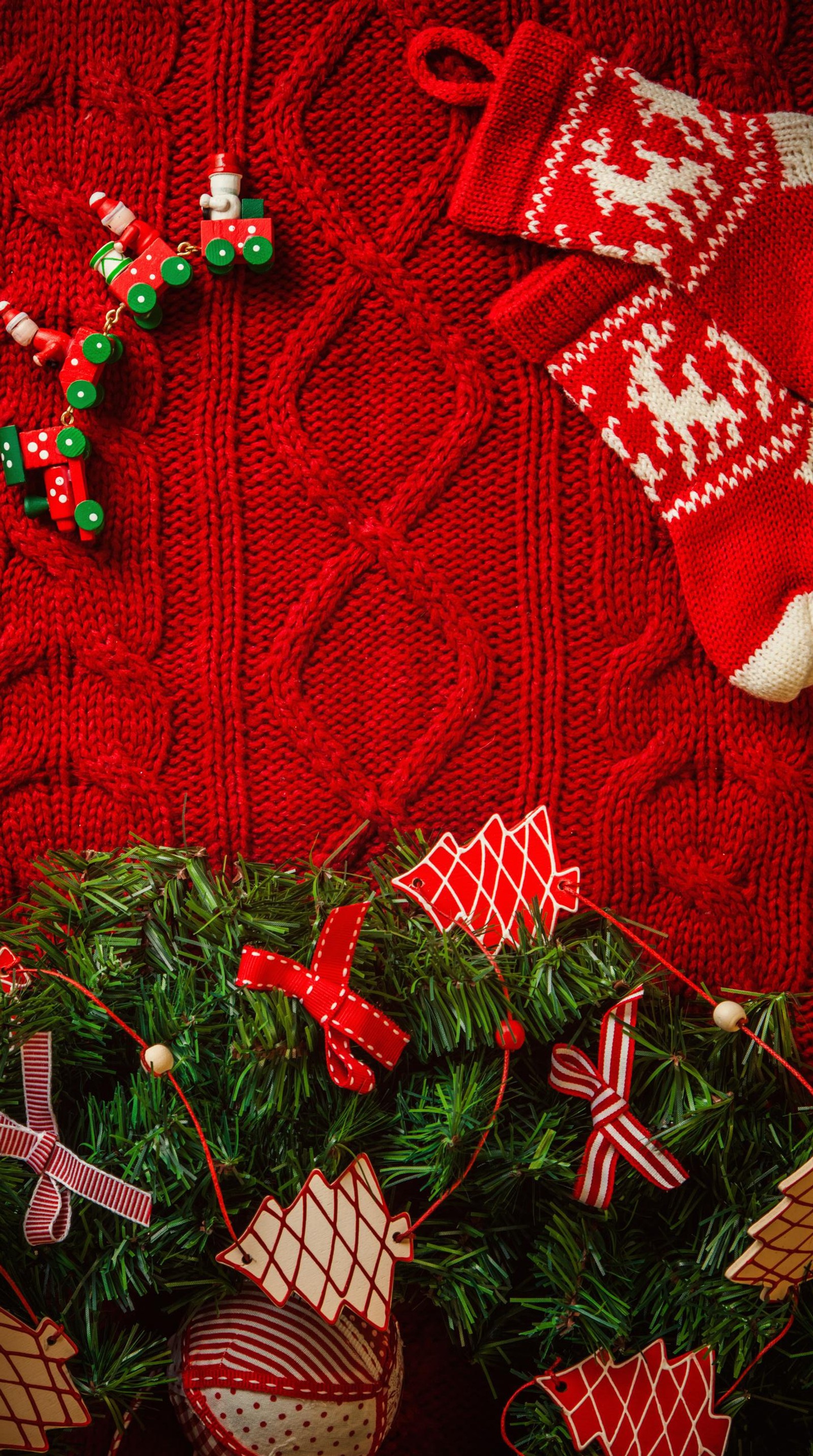 Arafed sweater with red and white decorations and a red mitt (christmas, decoration, red)