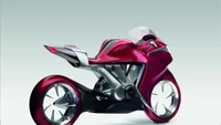 Diseño de moto deportiva Honda roja elegante con carenado futurista y ruedas de aleación