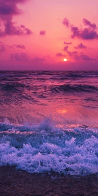 Vibrant Sunset Over Ocean Waves