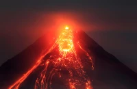 Erupting Volcano with Flowing Lava and Fiery Summit