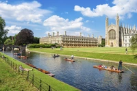 Tranquil Riverbank at University with Students and Punting Boats