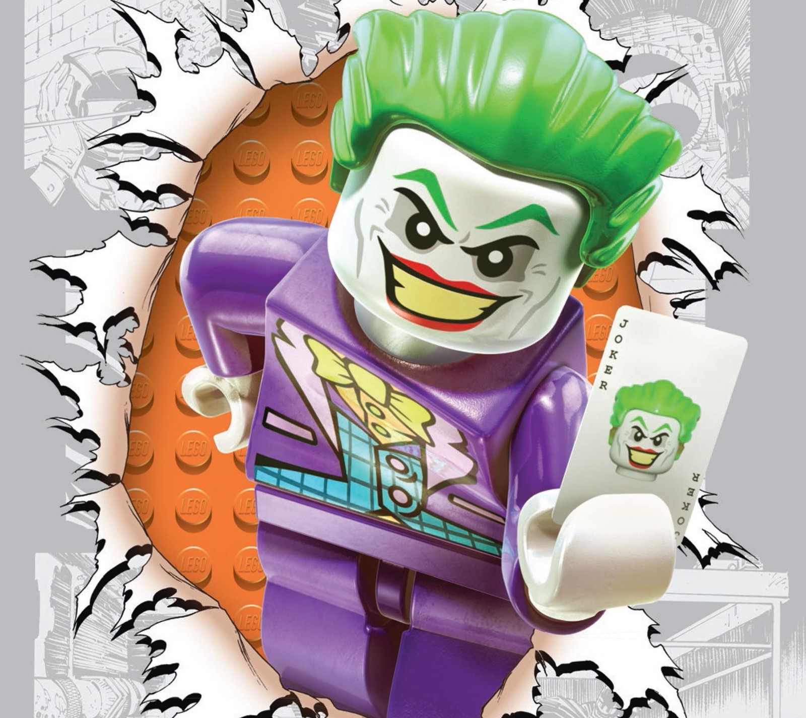 A close up of a lego batman character holding a card (batman, dc, joker)