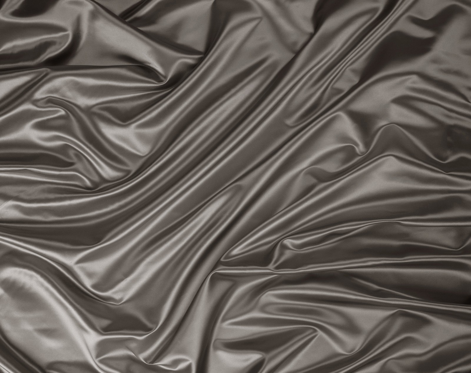 A close up of a black and white photo of a satin fabric (textile, pattern, metal, monochrome, monochrome mode)