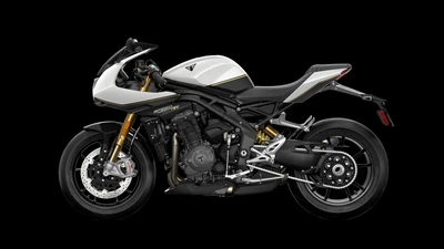 Triumph Speed Triple 1200 RS на гладком черном фоне