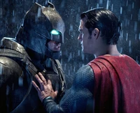 Batman and Superman Face Off in the Rain