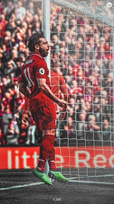 Mo Salah celebra um gol em Anfield