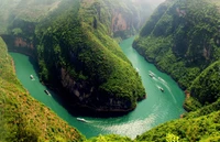 Scenic River Cruise Through Lush Green Valleys