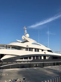 Luxury Motor Yacht Against a Clear Blue Sky