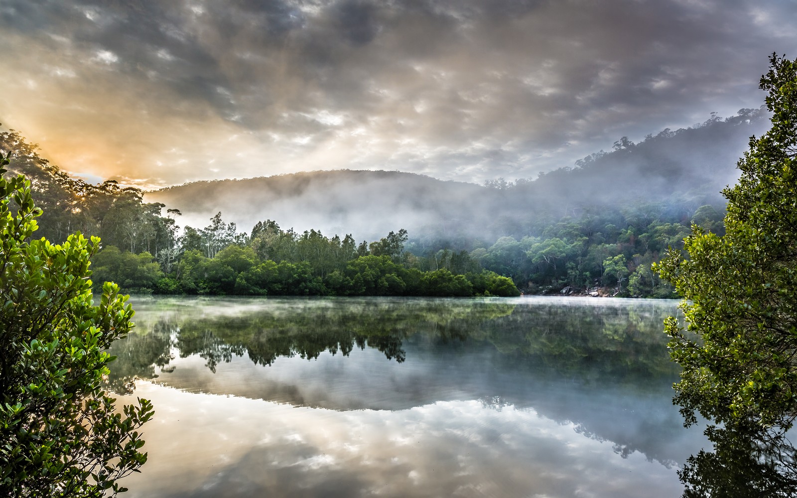 Arafed view of a lake with a mountain in the background (nature, reflection, water, water resources, vegetation)