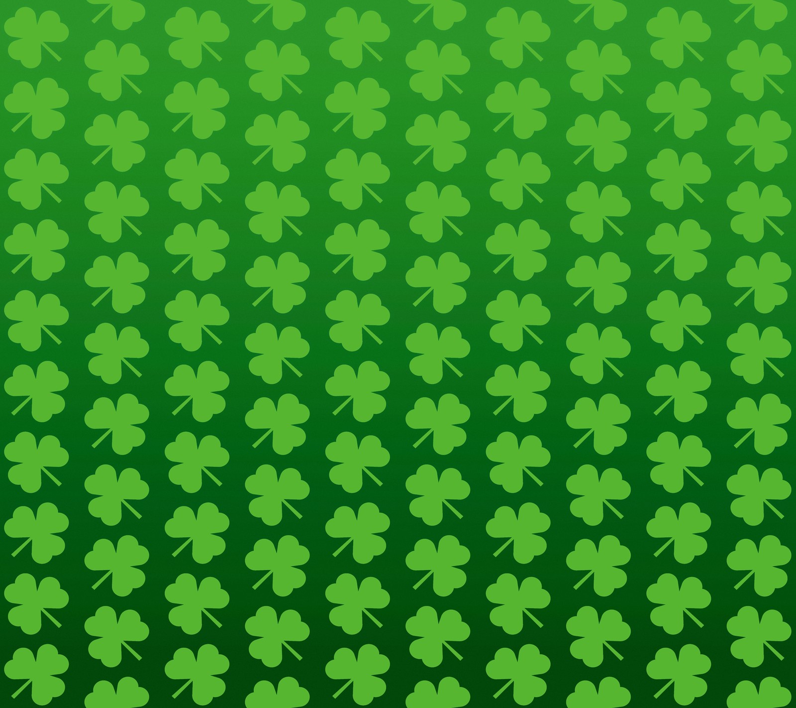 Um fundo verde com trevos de quatro folhas nele (verde, feriado, irlandês, trevo, são patrício)