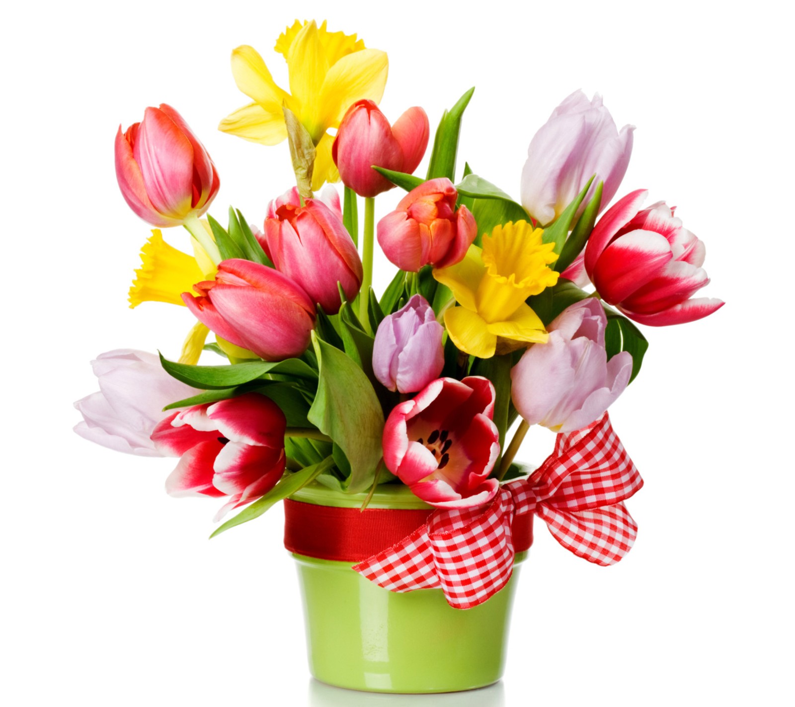 There is a green vase with a bunch of flowers in it (blooming, bouquet, spring, tulips)