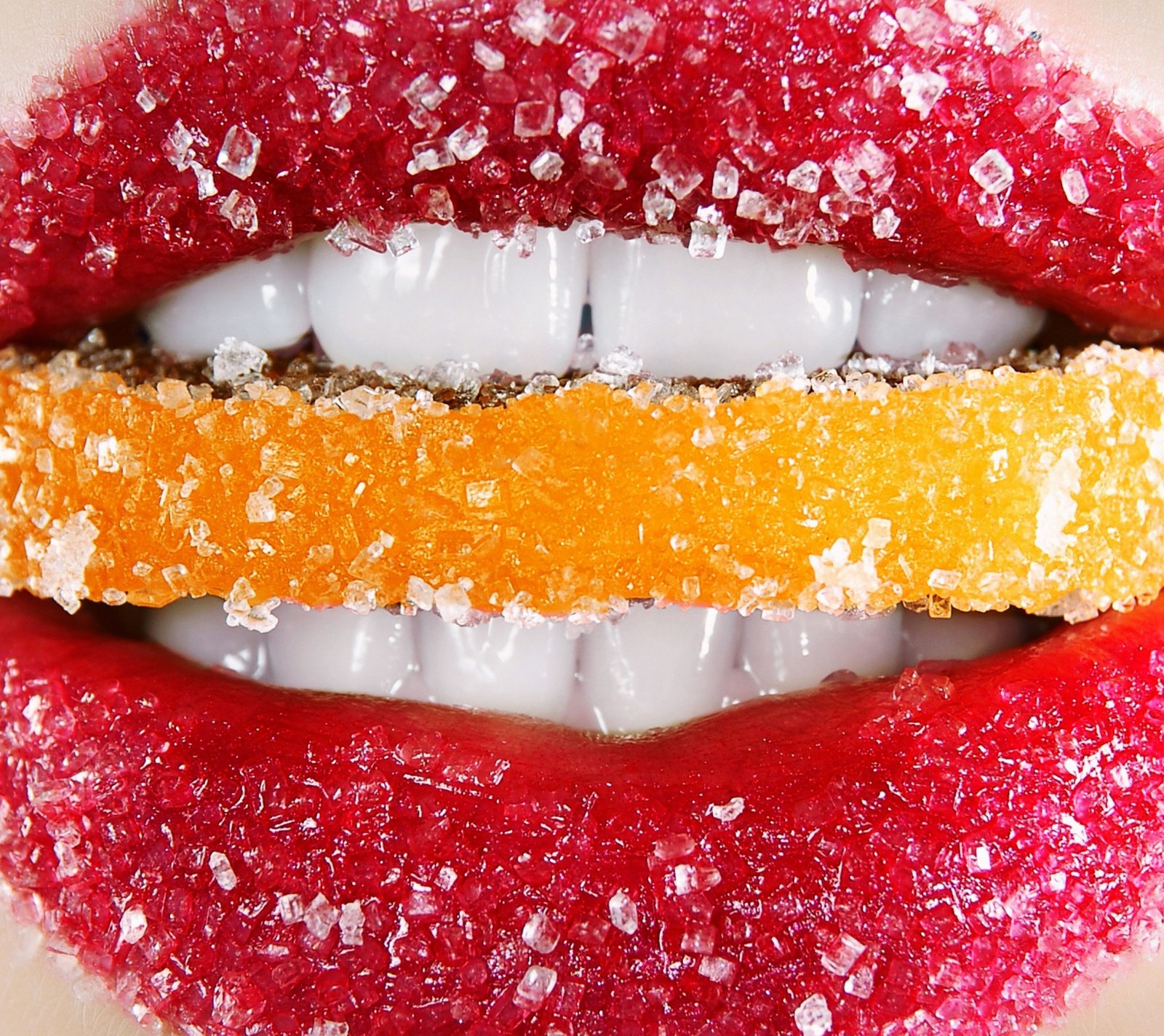 Araffe lips with sugar and orange slices on them (candy, lips)