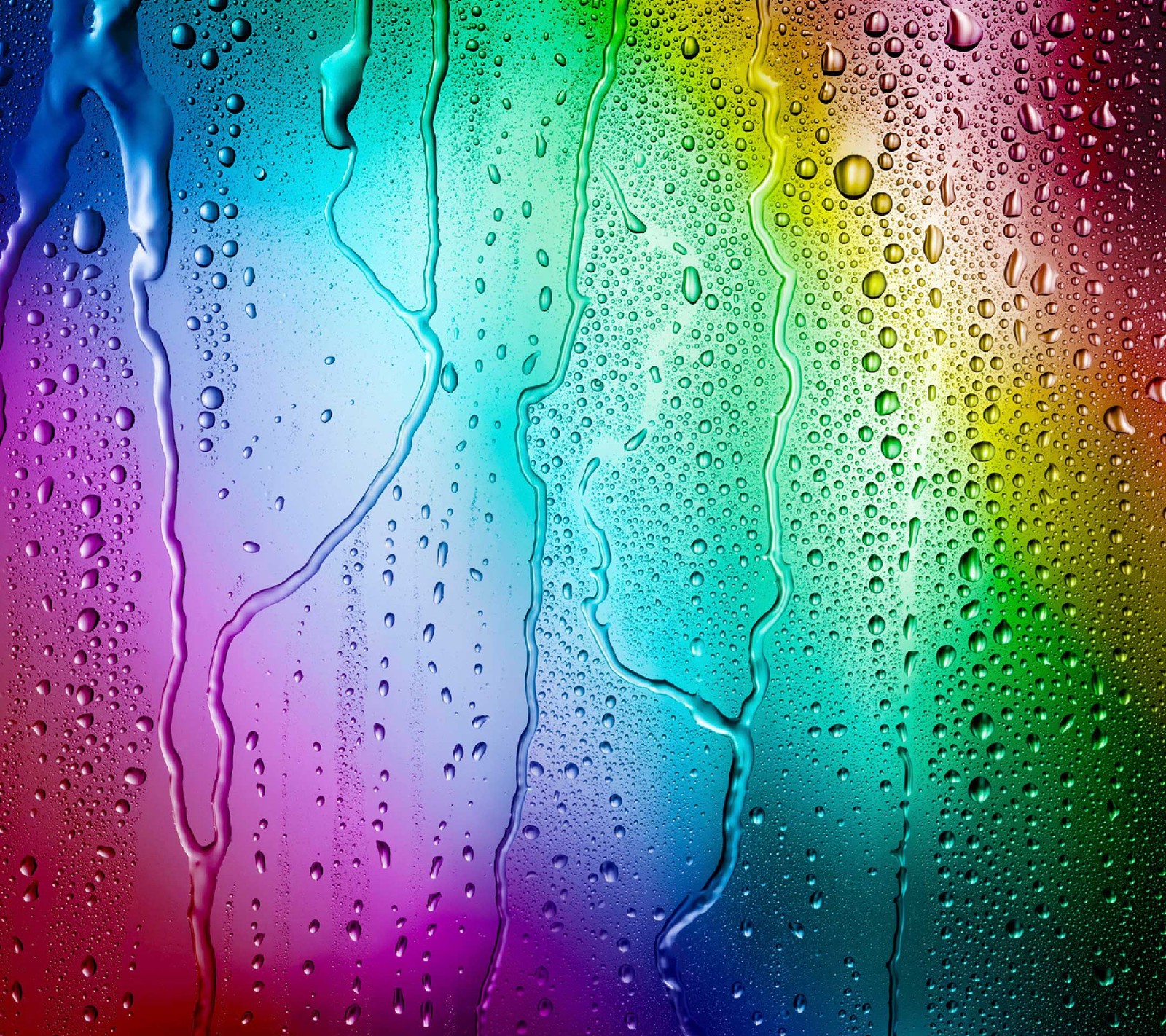 Un primer plano de gotas de lluvia de colores sobre una ventana. (color, agua)