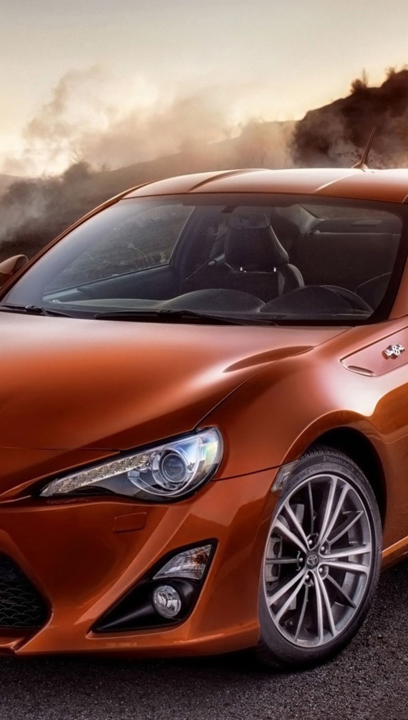 Крупный план спортивного автомобиля toyota 867, припаркованного на дороге (искусственный интеллект, я)