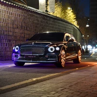 Bentley Flying Spur V8: A Luxurious High-Performance Sedan at Night