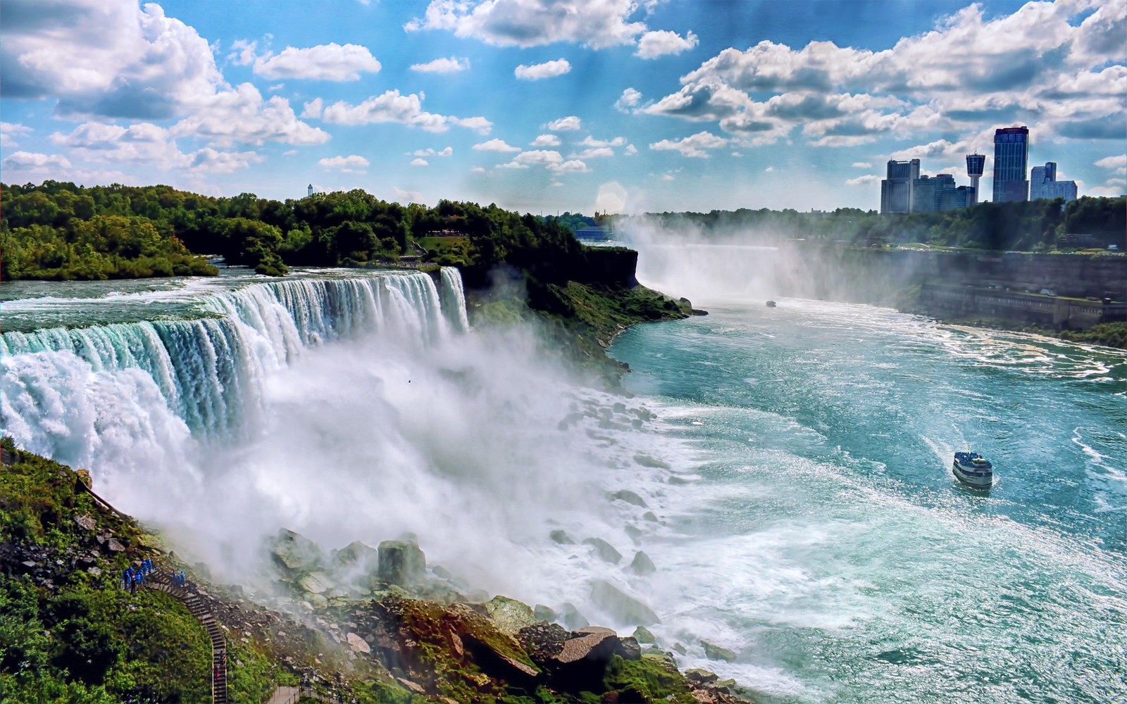 Arafed view of a waterfall with a boat in the water (american falls, waterfall, water resources, body of water, nature)