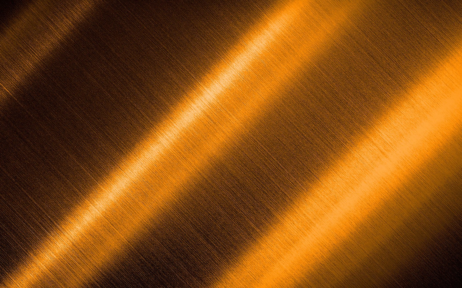 Un gros plan d'une surface métallique avec une surface très brillante (lumière, orange, jaune, atmosphère, ensoleillement)