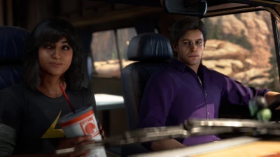 Kamala Khan and Bruce Banner share a moment on a road trip in the Marvels Avengers video game.