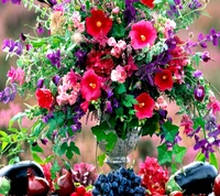 Vibrant Floral Arrangement Surrounded by Fresh Produce