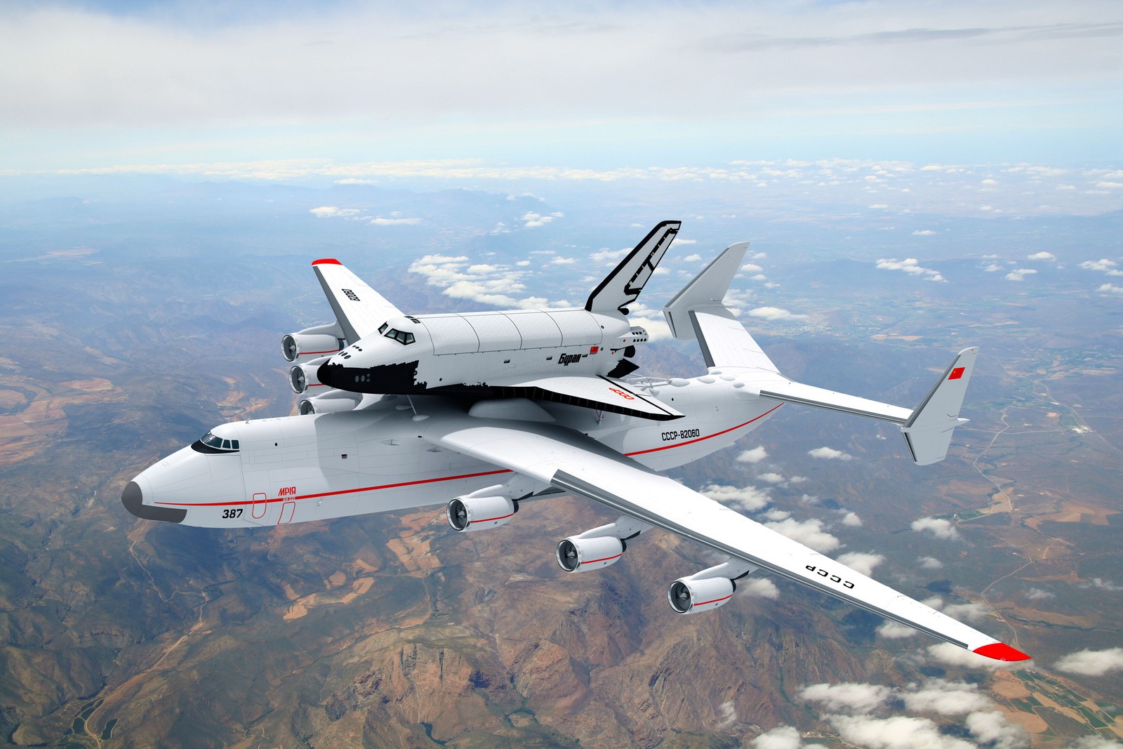 Arafed space shuttle on top of a plane flying over a mountain range (aircraft, airplane, buran, jet aircraft, military aircraft)