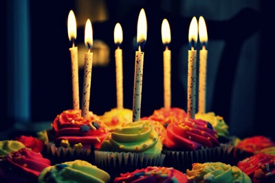 Colorful Cupcakes with Candles for a Birthday Celebration