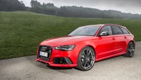 ABT Sportsline Audi RS6: A Bold Red Sports Wagon with Custom Rims