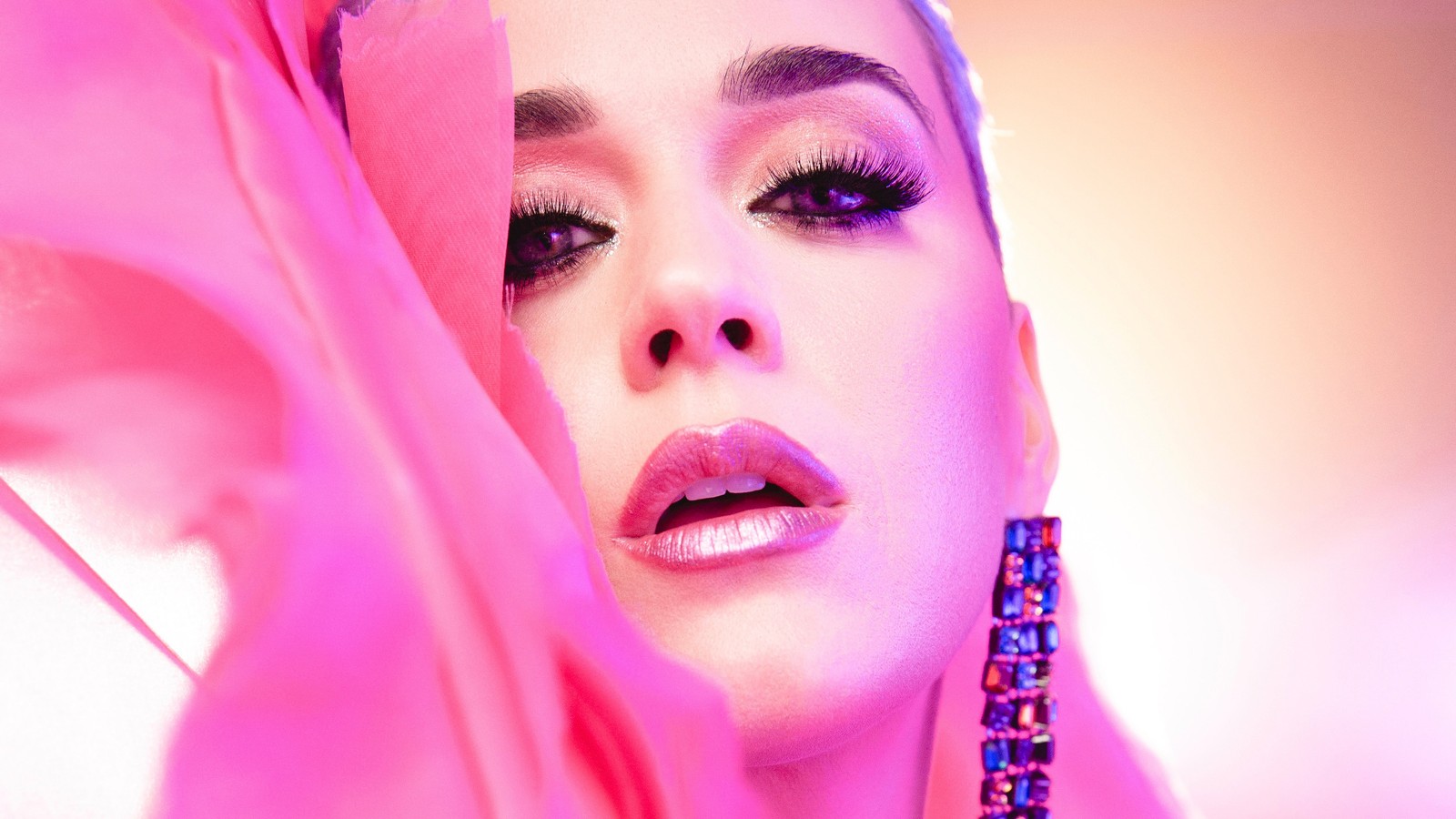 Araffe woman with pink scarf and earrings on her head (katy perry, singer, celebrity, women, girls)