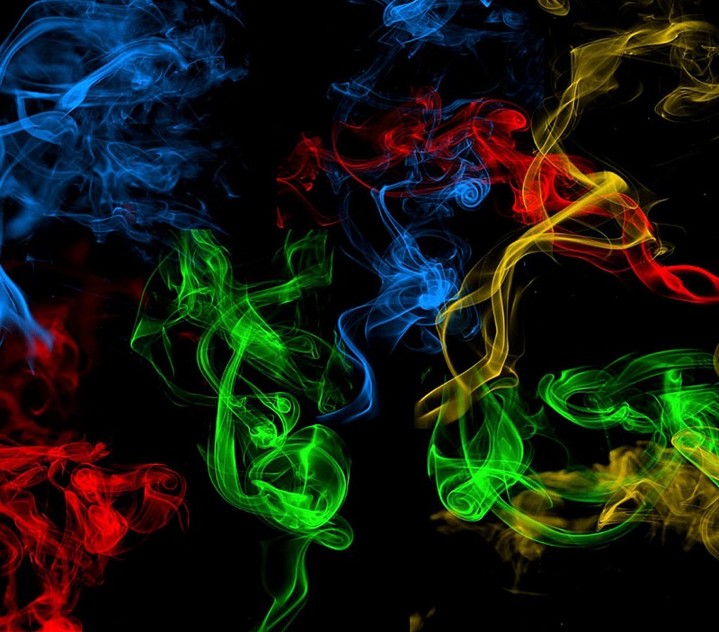 A close up of a group of colored smoke on a black background (nice, wallpapre)