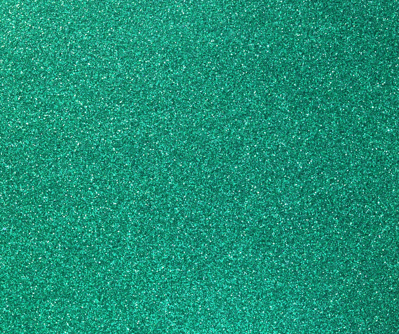 A close up of a green glitter background with a white border (meem, rubab)