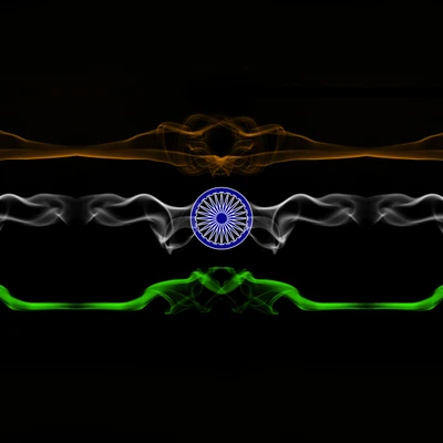 Abstract representation of the Indian flag with vibrant saffron, white, and green waves, featuring a central blue Ashoka Chakra, set against a black background.